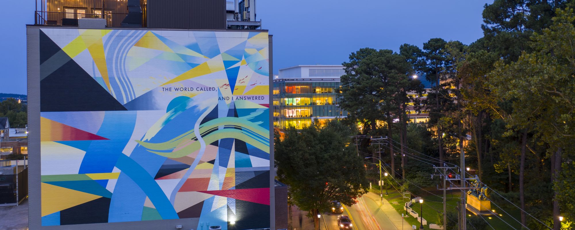 Mural on UVA Corner, features excerpt of Rita Dove Poem "The World Called and I answered"