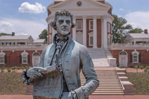 Photo of a statue of Thomas Jefferson that stands in front of the Rotunda building on UVA's campus